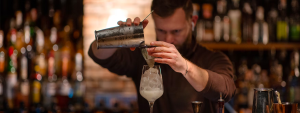 bartender making cocktails for money